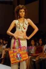 Model walk the ramp for Agarwalla & Vijay Golecha Show at The ABIL Pune Fashion Week Day 2 on 19th Nov 2010 (71)~0.JPG